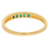 Princess Green Emerald and Gold Ring featuring sparkling gems and a sleek design, perfect for elegant styling.